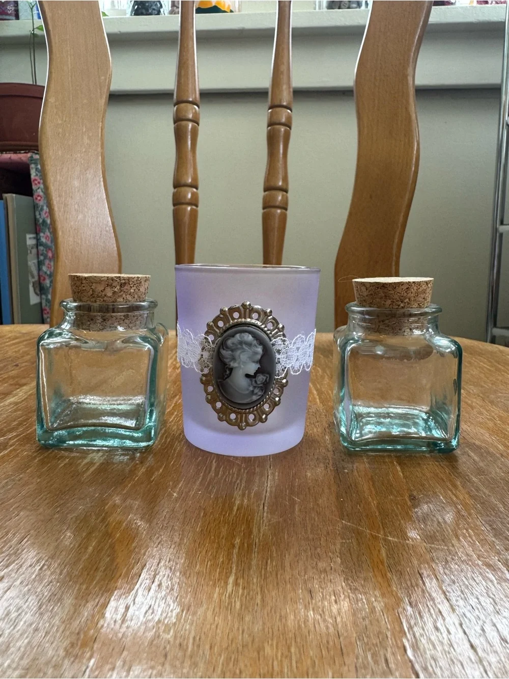 Set of 2 Mini Glasses Jars and 1 Votive Candle Holder.